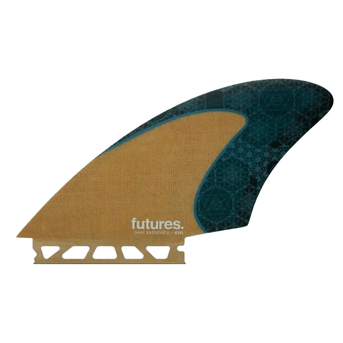 Shapers-Club- Un aileron de planche de surf étiqueté « Futures - Dave Rastovich Keel Jute Honey Comb » en texte blanc. L'aileron présente une section marron clair à gauche et une section bleu sarcelle foncé avec des motifs géométriques à droite, rappelant le style de Dave Rastovich. Le bord inférieur présente une structure en treillis pour la fixation du Honey Comb. -surfshop-surfboard
