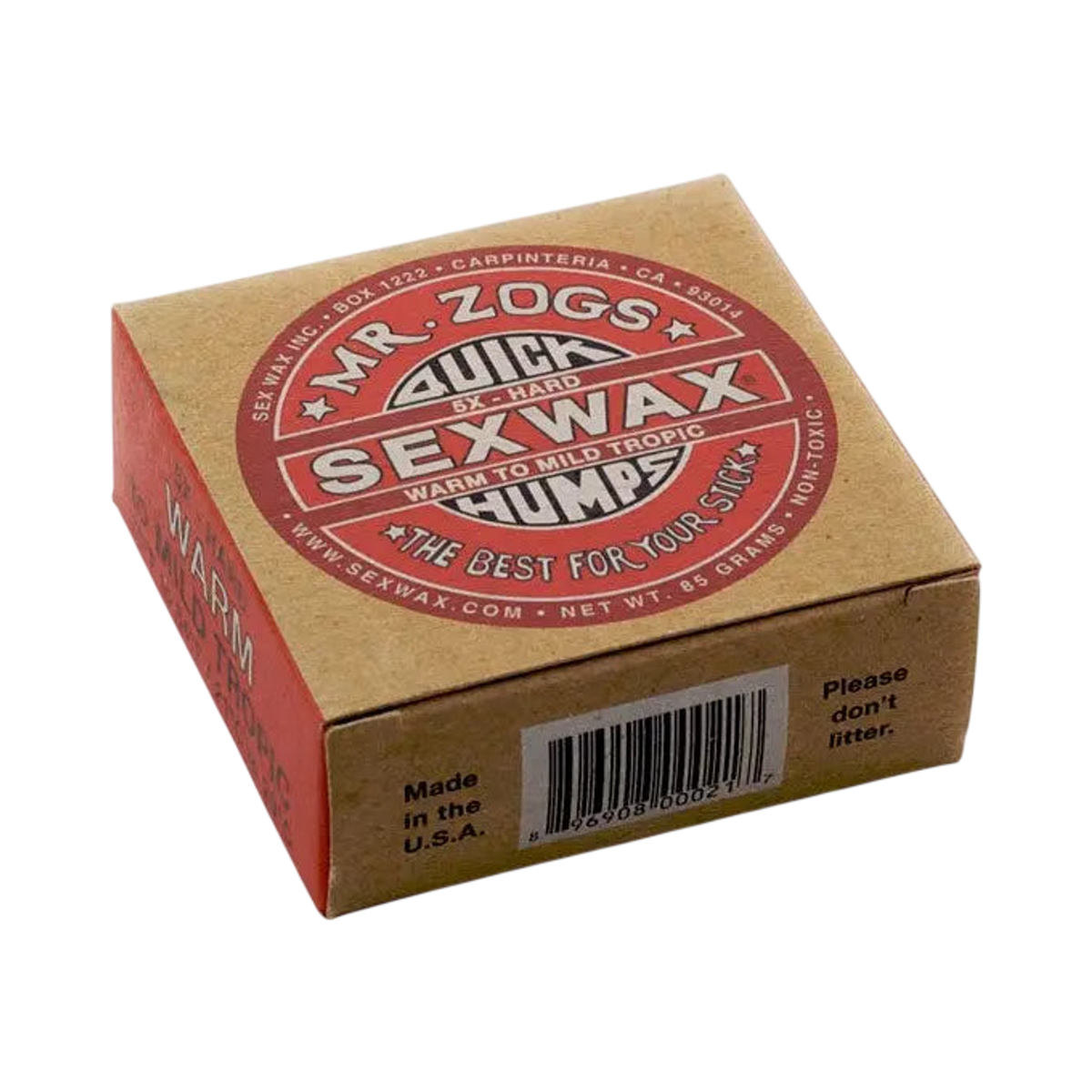 Shapers-Club- Une boîte en carton de Sexwax - Warm Tropical, idéale pour les ondulations tropicales chaudes, comporte une étiquette rouge et blanche indiquant « Le meilleur pour votre bâton ». L'emballage comporte un code-barres ainsi que des rappels : « Veuillez ne pas jeter de détritus » et « Fabriqué aux États-Unis ». -surfshop-surfboard