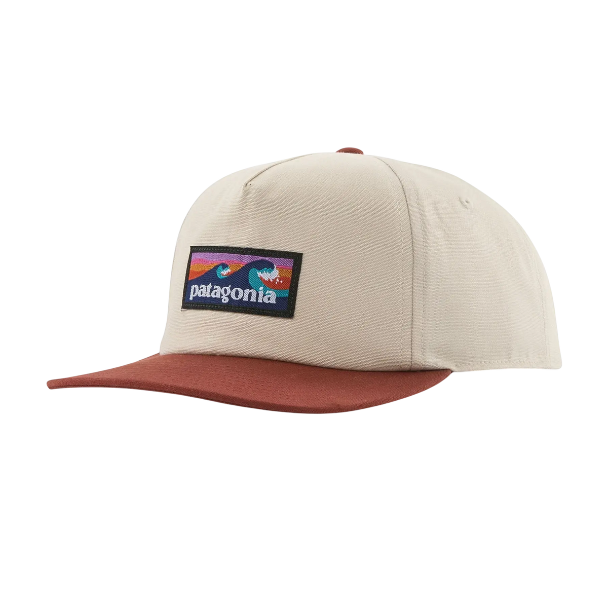Casquette Surfshop - Shapers Club House Patagonia Boardshort Label beige avec visière marron et logo vague coloré