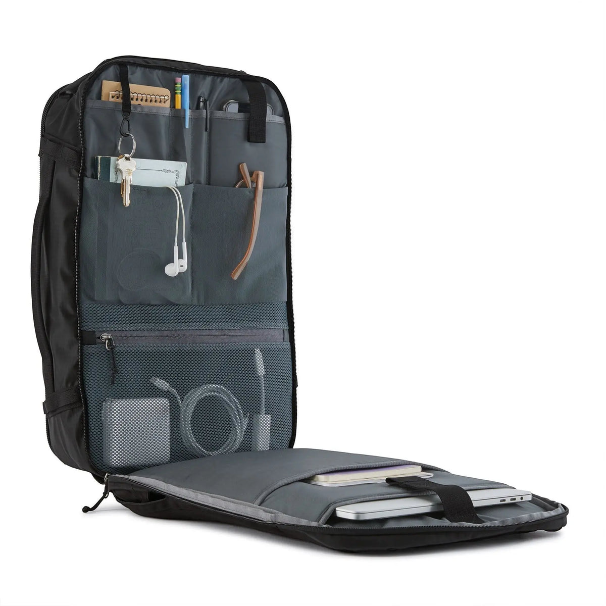 Sac à dos noir Patagonia Black Hole Mini MLC ouvert chez Surfshop - Shapers Club House avec rangements organisés