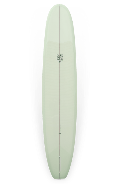 Shapers-Club- Planche de surf Dead Kooks - Casbah 9'6" x 22' 3/4" x 2' 3/4" vert clair, avec un longeron en bois centré qui court verticalement et le logo "Brad Knox" positionné près du haut. Cette planche présente un design lisse et arrondi adapté au surf. Le fond blanc ajoute un effet flottant à son apparence élégante. -surfshop-surfboard