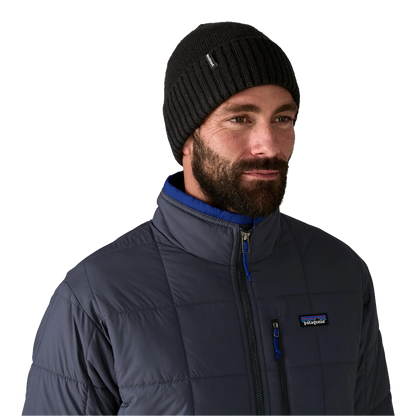 Patagonia - Bonnets - Fishermans Rolled Beanie noir Patagonia Purpose Trust