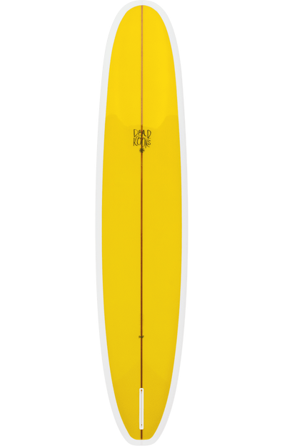 Shapers-Club- Une planche de surf mesurant 9'6" x 23" x 3" avec une surface jaune, un bord blanc et une bande verticale sombre au centre. La planche comporte un logo central avec "David King" en lettres stylisées rappelant le design de Guerrero. Sa forme allongée et légèrement incurvée est caractéristique des styles Dead Kooks. -surfshop-surfboard