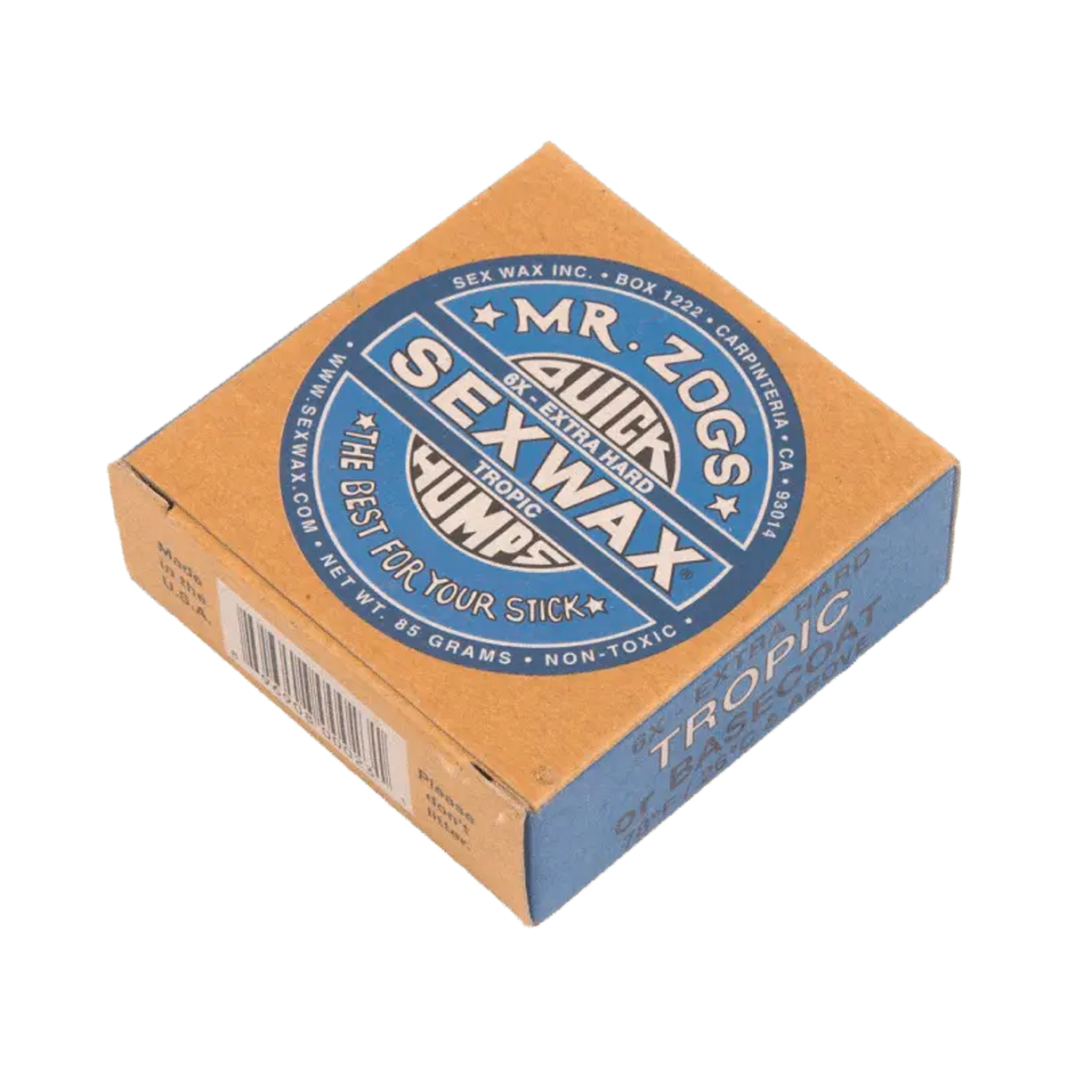 Shapers-Club- Une boîte marron et bleue de Sexwax - Tropic Basecoat de Mr. Zog, étiquetée « Quick Humps Tropic » et « The Best for Your Stick ». La boîte indique qu'elle est extra dure, non toxique et pèse 85 grammes. Idéal comme couche de base pour votre planche. -surfshop-surfboard