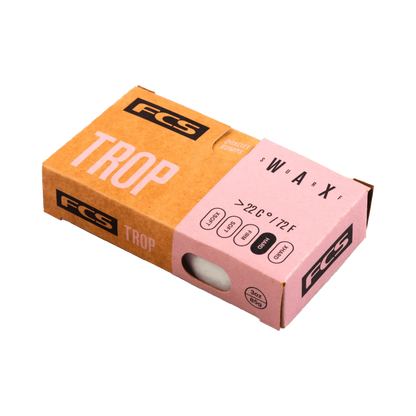 Shapers-Club- Une boîte de cire pour planche de surf FCS - Wax - Trop rectangulaire, bicolore marron et rose est présentée. La boîte comporte des icônes circulaires et des recommandations de température, indiquant qu'elle convient à des températures de 20 °C (72 °F) ou plus. -surfshop-surfboard
