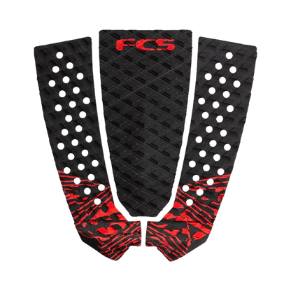 Shapers-Club- The Toledo Blood traction cushion is black with red accents and features a "FCS" logo clearly visible on the top. It features a diamond-patterned texture, white circular grip points and is cleverly divided into three sections. -surfshop-surfboard